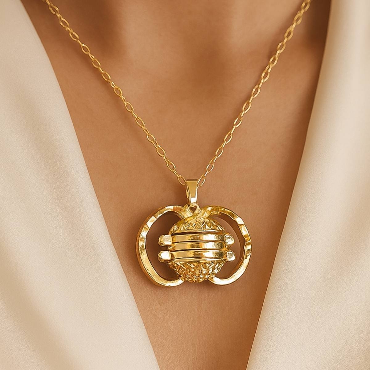 Four Gold Ball Locket Necklace