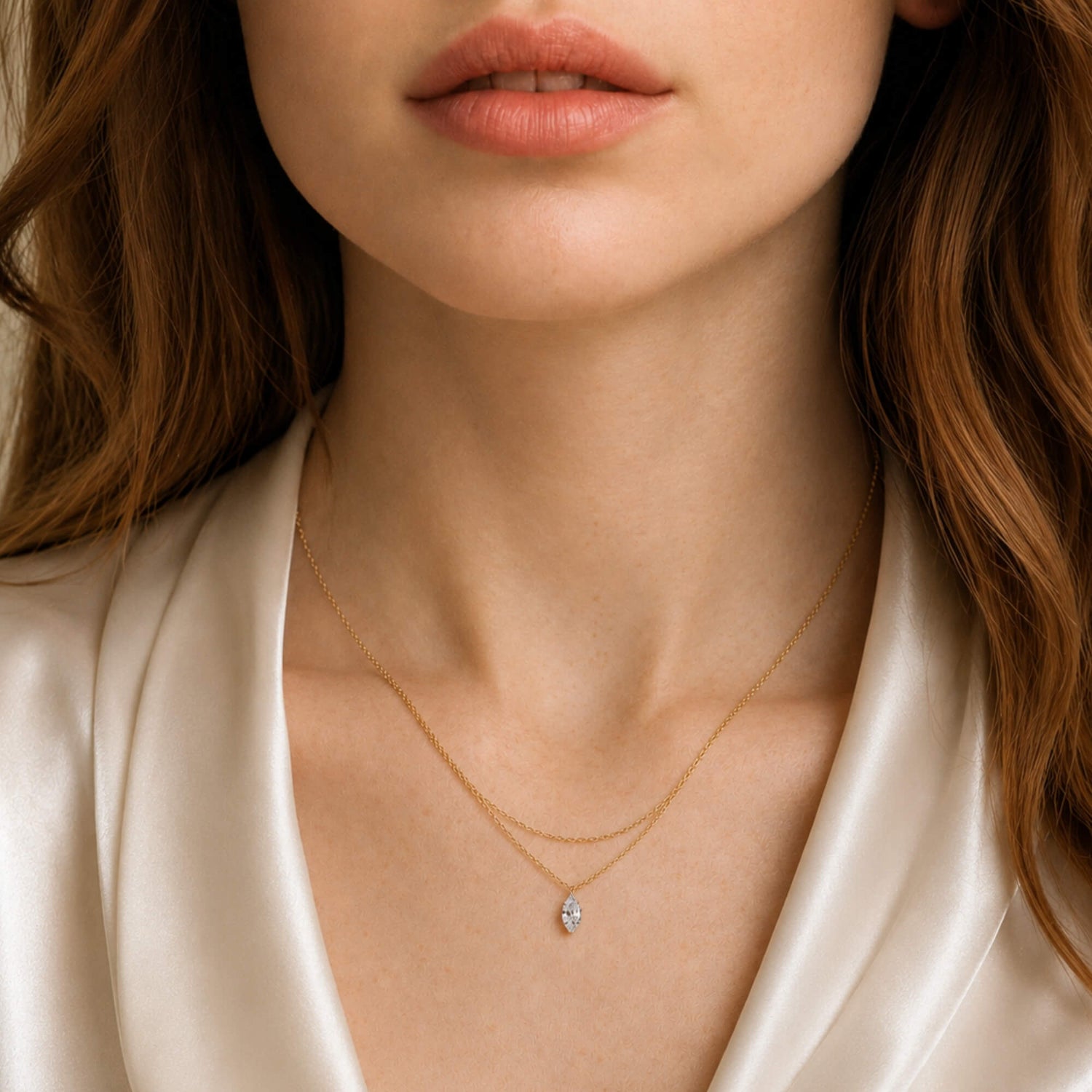woman wearing a marquise layered diamond necklace