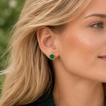 woman wearing green malachite clover stud earrings 