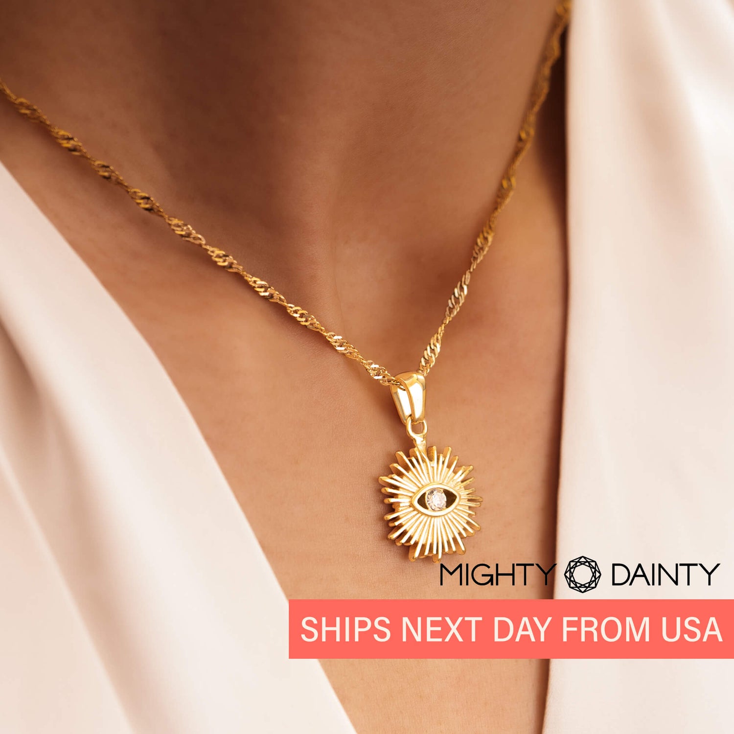 woman wearing evil eye necklace