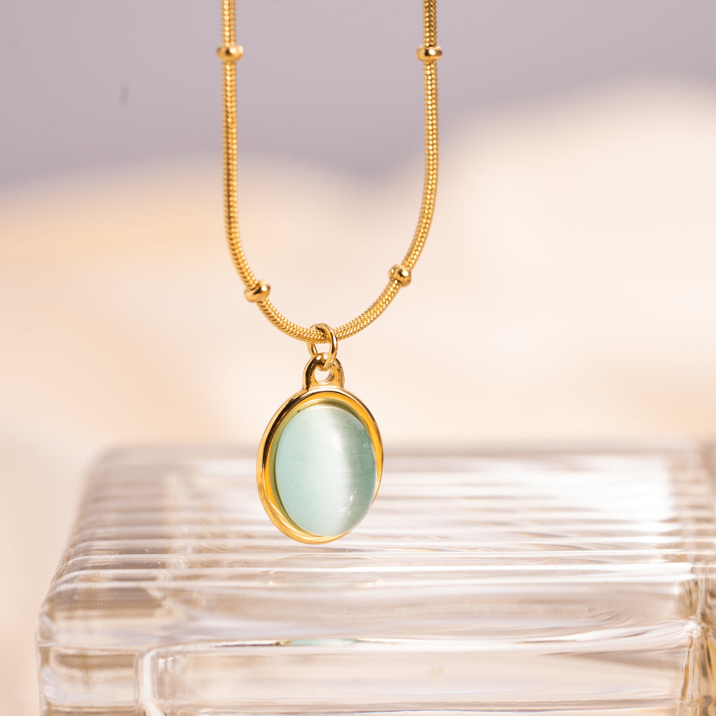 Gold snake and ball chain natural opal stone pendant