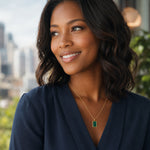 woman wearing a green malachite necklace