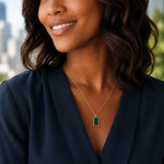 woman wearing a green malachite necklace
