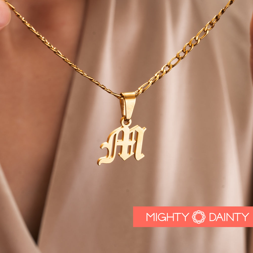 Gold plated initial necklace with old english font 