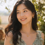 woman wearing an interlocking circle necklace