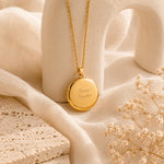 gold round locket necklace