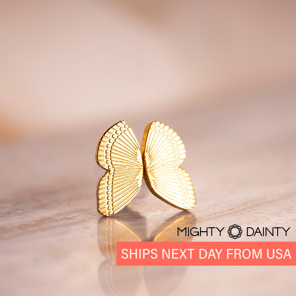 Tiny gold butterfly stud earrings 
