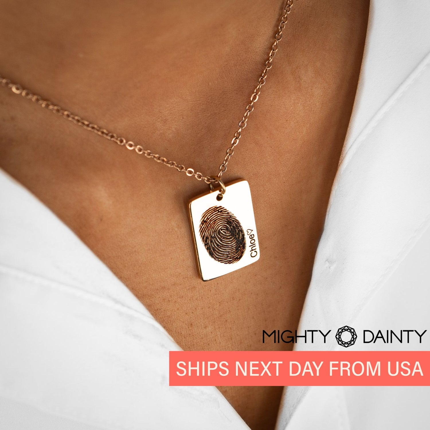 woman wearing a custom fingerprint name necklace