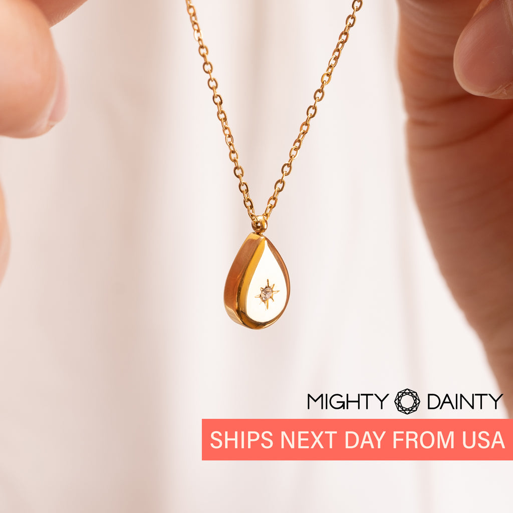 Teardrop shape gold necklace with cubic zirconia