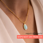 Gold chain pendant with natural opal